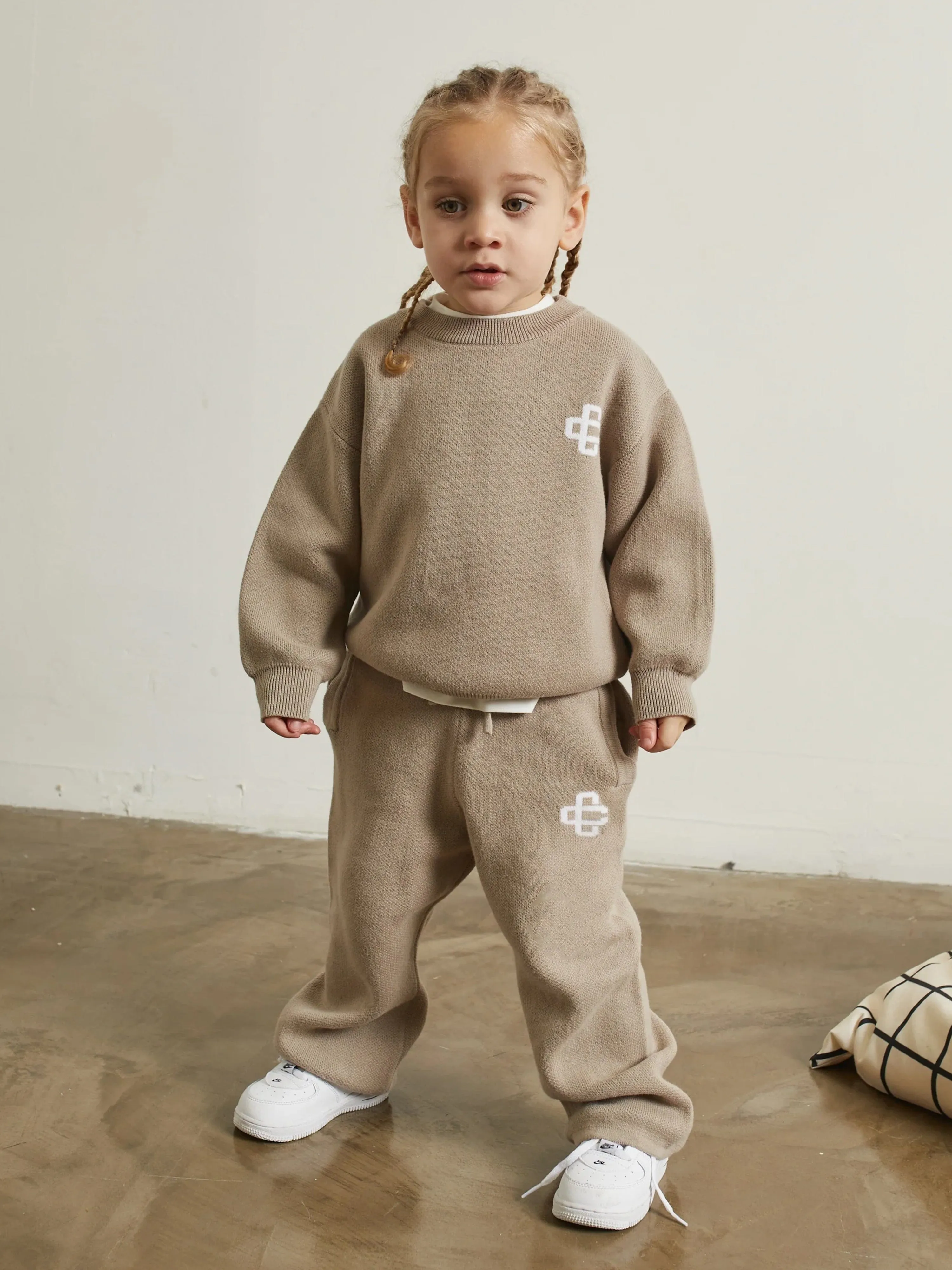 The Couture Club Kids Knitted Emblem Joggers in Beige